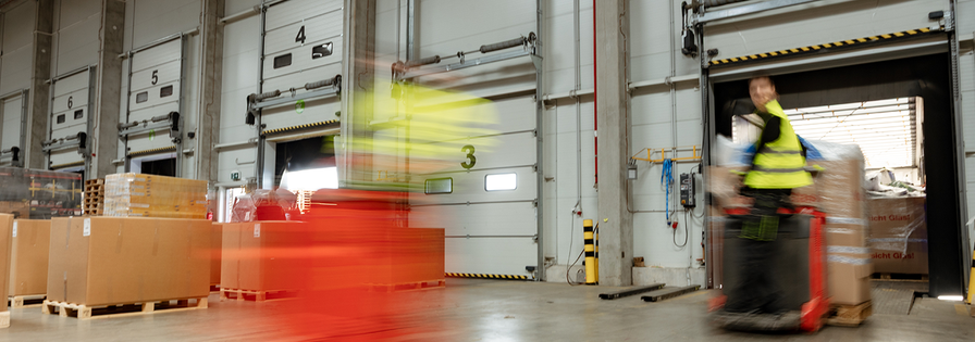 Industries Retail Warehouse fork-lift driver blurry