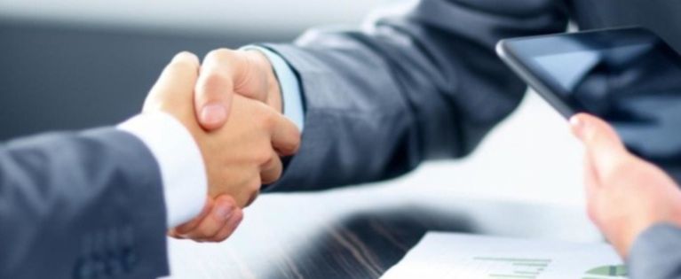 handshake business table tablet