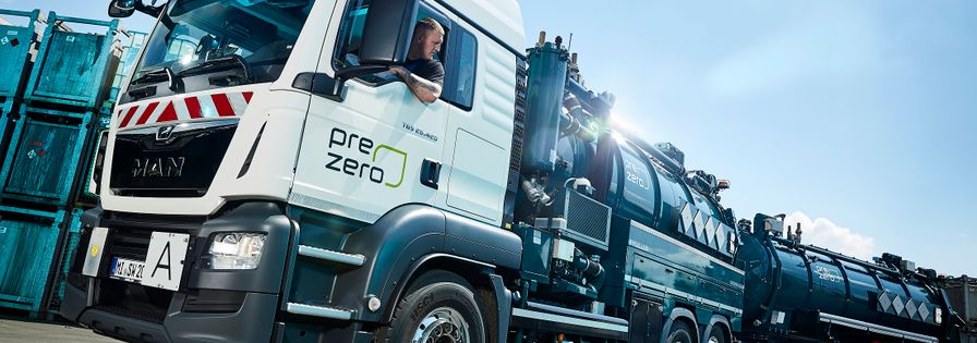 Employee in truck with trailor