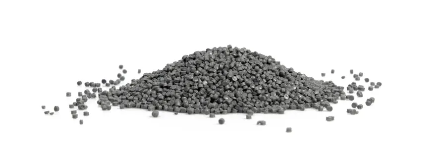 Pile of gray plastic granules on a white background