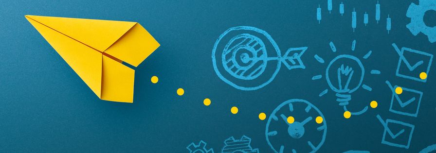 Gult pappersflygplan mot grön bakgrund med symboler